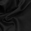 High-quality wool blend with a cashmere-like hand. Deep black color, soft pile, and compact construction ideal for classic coats.